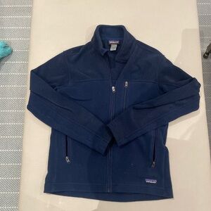 Patagonia Men's Synchilla full-zip fleece jacket in navy blue.